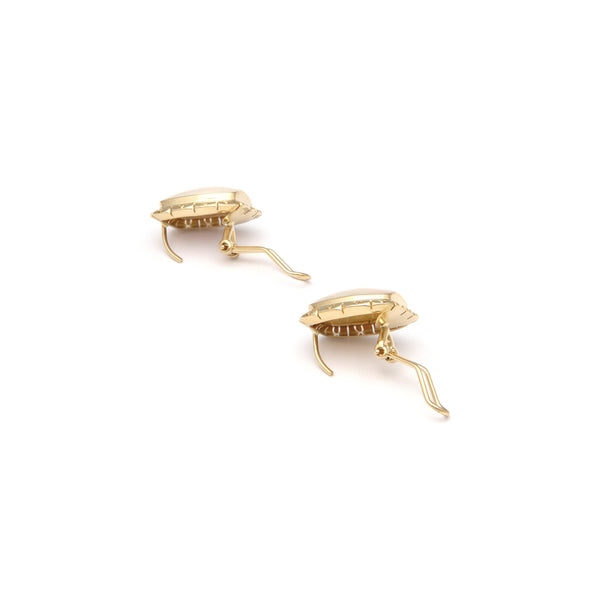 Juego de anillo y aretes diseño especial con perlas osmeñas barril en oro amarillo 14 kilates.