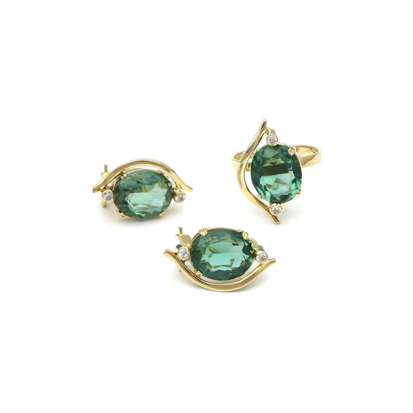 Juego de anillo y aretes calados con cuarzos y circonias en oro amarillo 14 kilates.