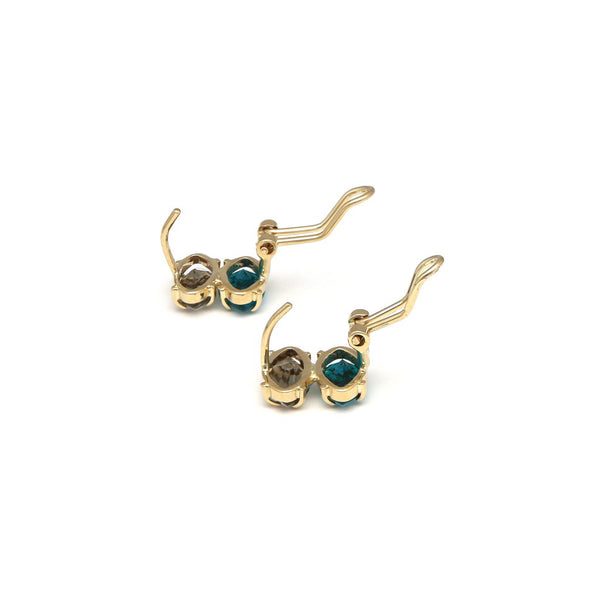 Aretes diseño especial con topacio y obsidiana en oro amarillo 14 kilates.