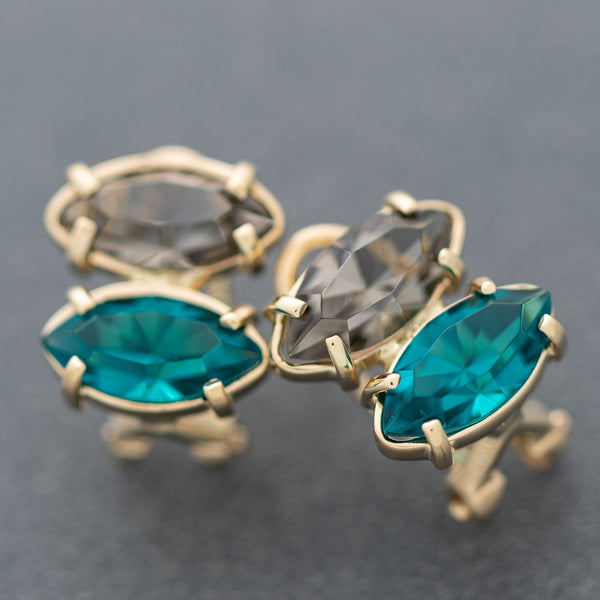 Aretes diseño especial con topacio y obsidiana en oro amarillo 14 kilates.