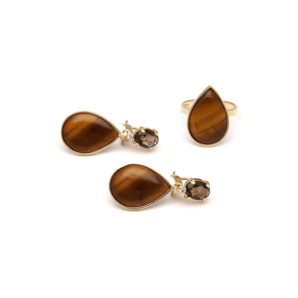 Juego de anillo y aretes estilizados con colgantes de topacios, ojos de tigre y sintéticos en oro amarillo 14 kilates.
