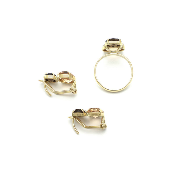 Juego de anillo y aretes diseño especial con citrino y topacio en oro amarillo 14 kilates.