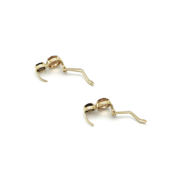 Juego de anillo y aretes diseño especial con citrino y topacio en oro amarillo 14 kilates.