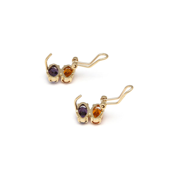 Juego de anillo y aretes diseño especial con amatistas y citrinos en oro amarillo 14 kilates.