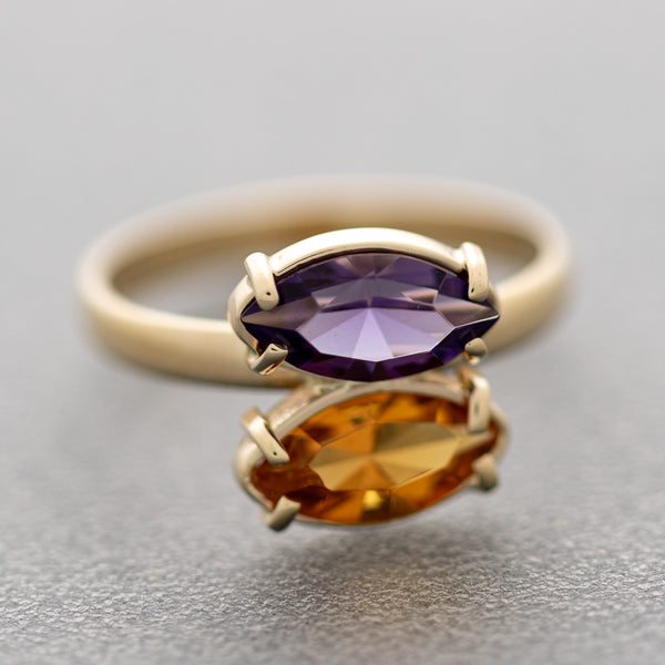 Juego de anillo y aretes diseño especial con amatistas y citrinos en oro amarillo 14 kilates.
