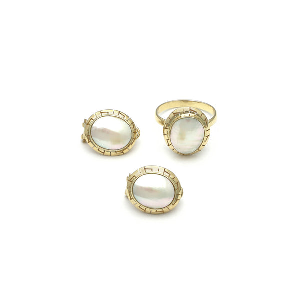 Juego de anillo y aretes calados con osmeña oro amarillo 14 kilates.