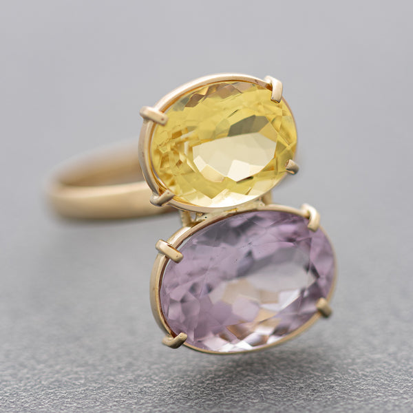 Juego de anillo y aretes diseño especial con amatista y citrino en oro amarillo 14 kilates.