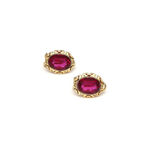Aretes diseño especial con rubíes en oro amarillo 14 kilates.