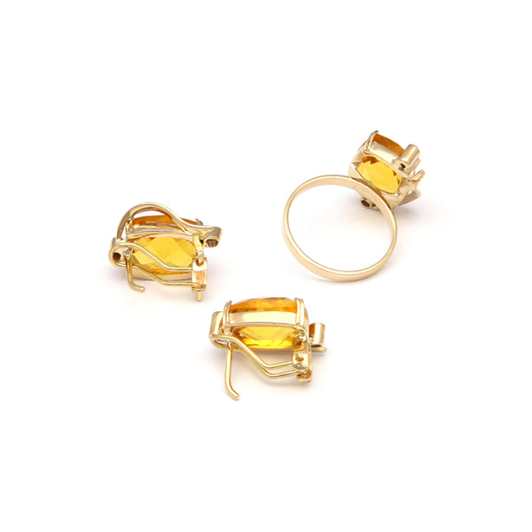 Juego de anillo y aretes calados con citrinos y sintéticos en oro amarillo 14 kilates.