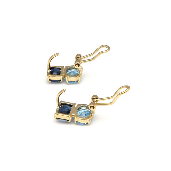 Juego de anillo y aretes diseño especial con Zafiro y Aguamarina en oro amarillo 14 kilates.