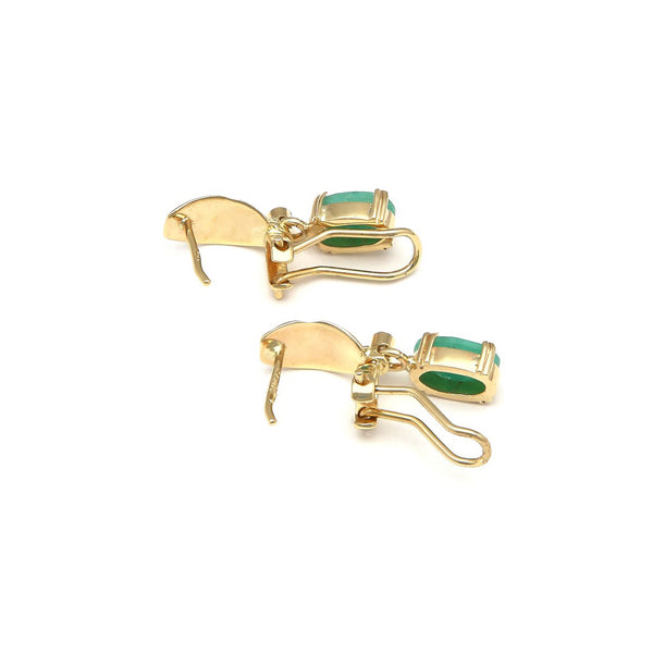 Juego de anillo, aretes y dije diseño especial con diamantes y esmeraldas en oro amarillo 14 kilates.