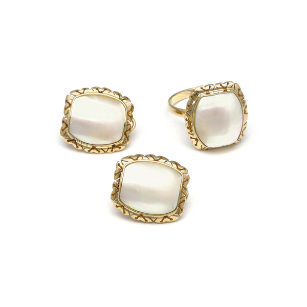 Juego de anillo y aretes calados con osmeña oro amarillo 14 kilates.