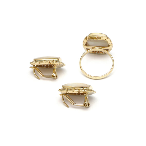 Juego de anillo y aretes calados con osmeña oro amarillo 14 kilates.