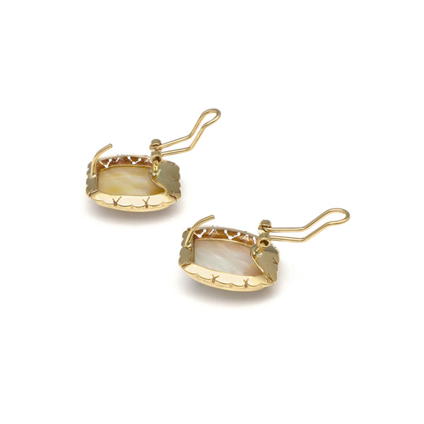 Juego de anillo y aretes calados con osmeña oro amarillo 14 kilates.