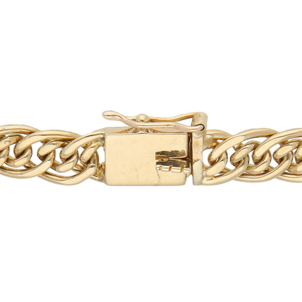 Pulsera eslabón combinado en oro amarillo 14 kilates.