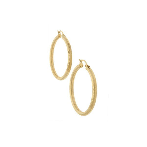 Arracadas tubulares en oro amarillo 14 kilates.