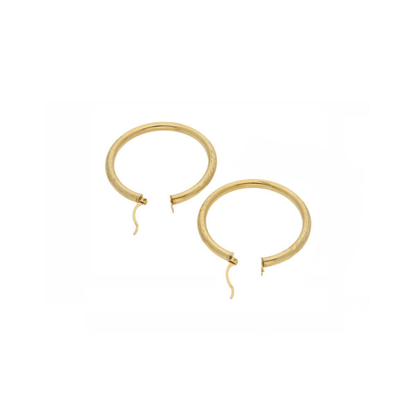 Arracadas tubulares en oro amarillo 14 kilates.