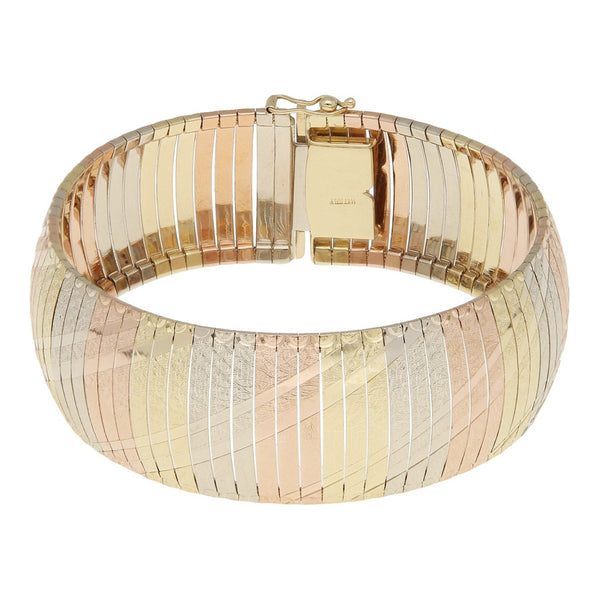 Pulsera eslabón laminado en oro tres tonos 14 kilates.