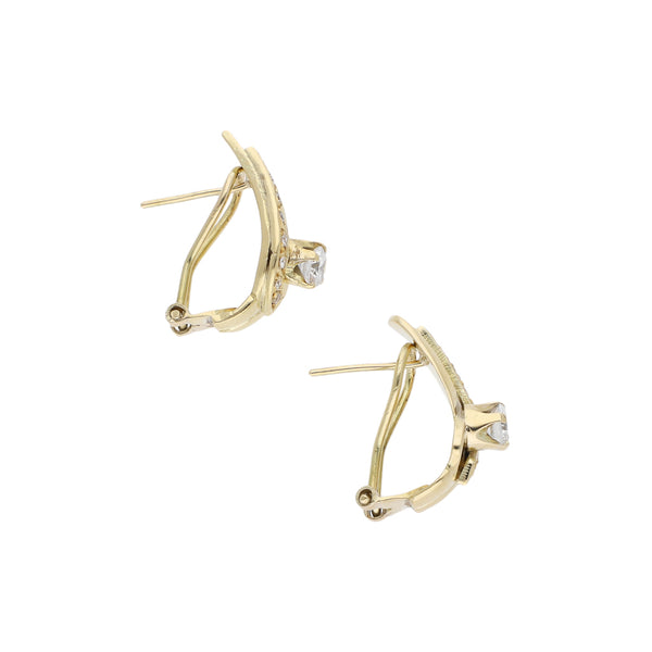 Aretes diseño especial con sintéticos en oro amarillo 14 kilates.