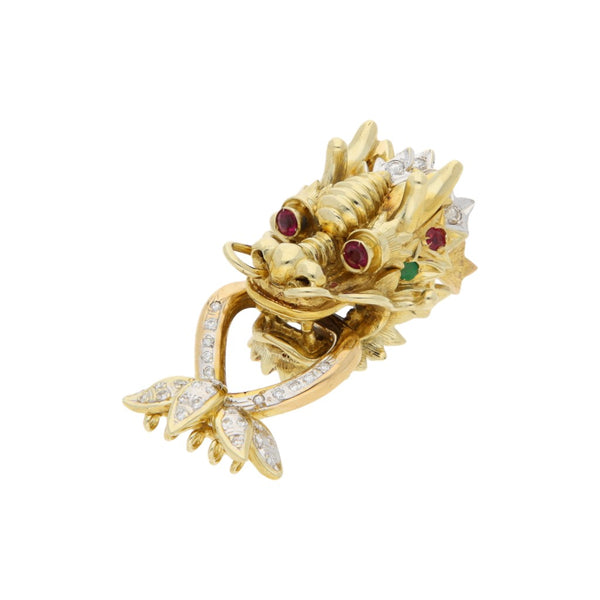Dije diseño especial motivo cabeza de dragón con diamantes y gemas en oro amarillo 14 kilates.