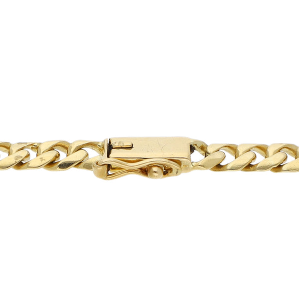 Pulsera eslabón encontrado con aplicaciones y esmeraldas en oro amarillo 18 kilates.