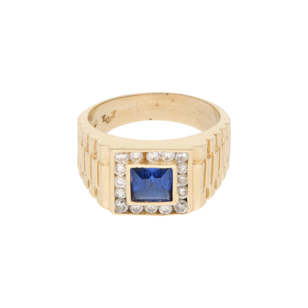 Anillo tipo sello con sintéticos en oro amarillo 14 kilates.