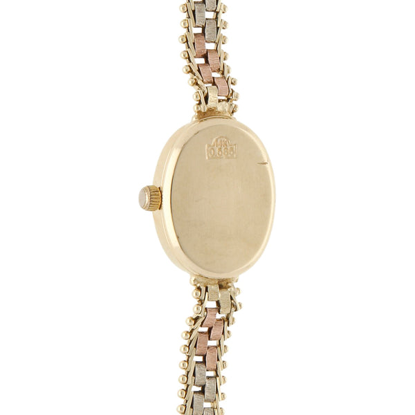 Reloj Geneve para dama en oro tres tonos 14 kilates.