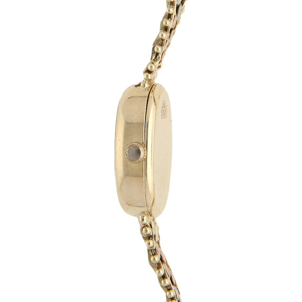 Reloj Geneve para dama en oro tres tonos 14 kilates.