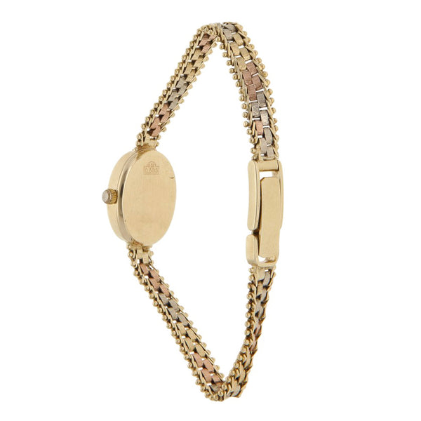 Reloj Geneve para dama en oro tres tonos 14 kilates.