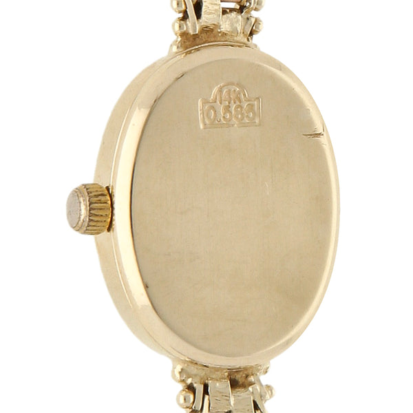 Reloj Geneve para dama en oro tres tonos 14 kilates.