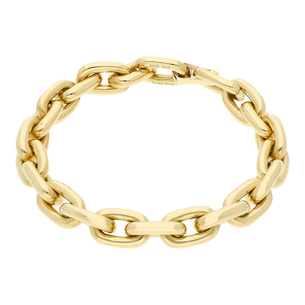 Pulsera eslabón cruzado firma Tane en oro amarillo 18 kilates.