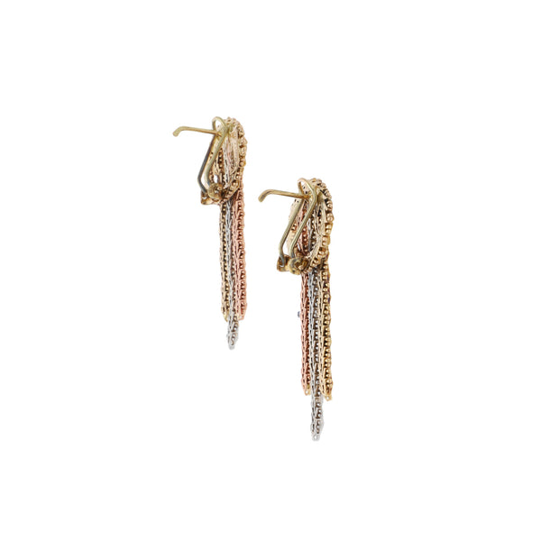 Aretes boleados en oro tres tonos 14 kilates.