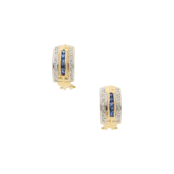 Aretes diseño especial con diamantes y zafiros en oro amarillo 14 kilates.