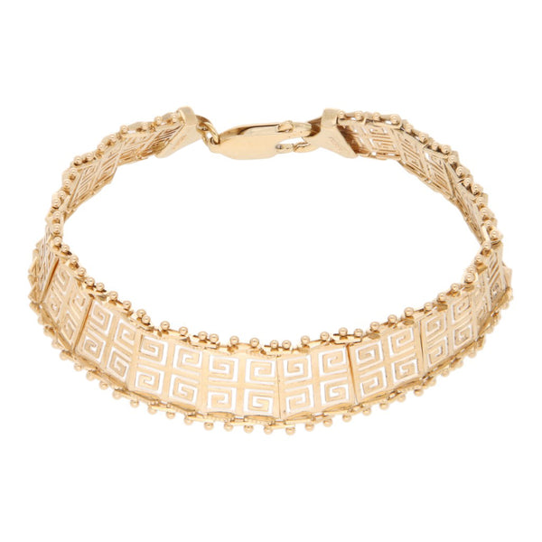 Pulsera eslabón boleado motivo grecas en oro amarillo 14 kilates.