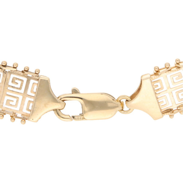 Pulsera eslabón boleado motivo grecas en oro amarillo 14 kilates.