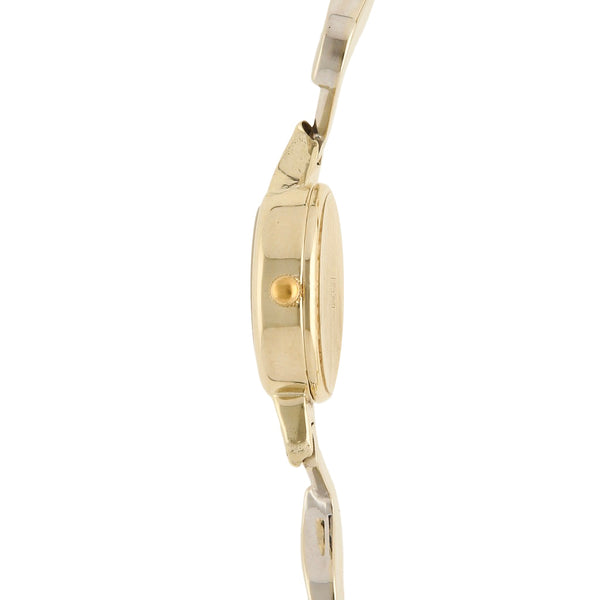 Reloj Geneve para dama en oro dos tonos 14 kilates.