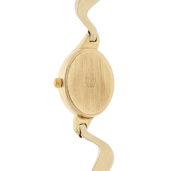 Reloj Geneve para dama en oro dos tonos 14 kilates.