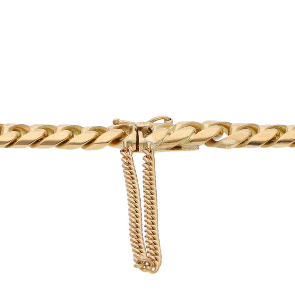 Pulsera eslabón encontrado con una moneda de cinco y dos y medio pesos oro Mexicano 21.6 kilates en oro amarillo 18 kilates.