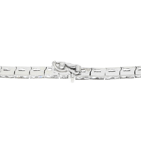 Pulsera articulada con circonias en oro blanco 14 kilates.