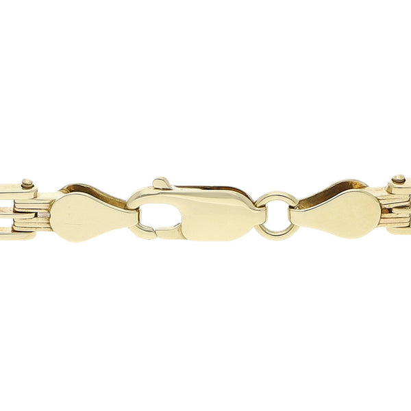 Pulsera articulada en oro amarillo 14 kilates.