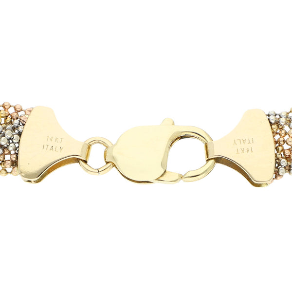 Pulsera eslabón trenzado en oro tres tonos 14 kilates.