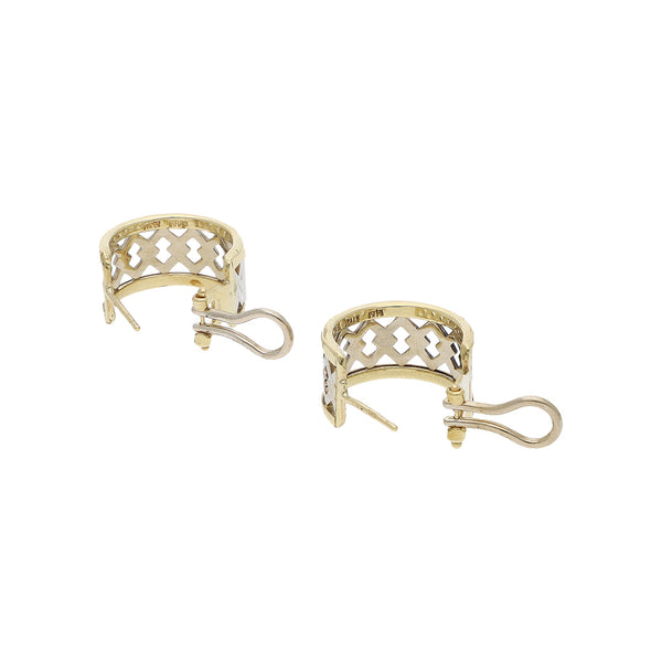 Aretes calados en oro dos tonos 14 kilates.