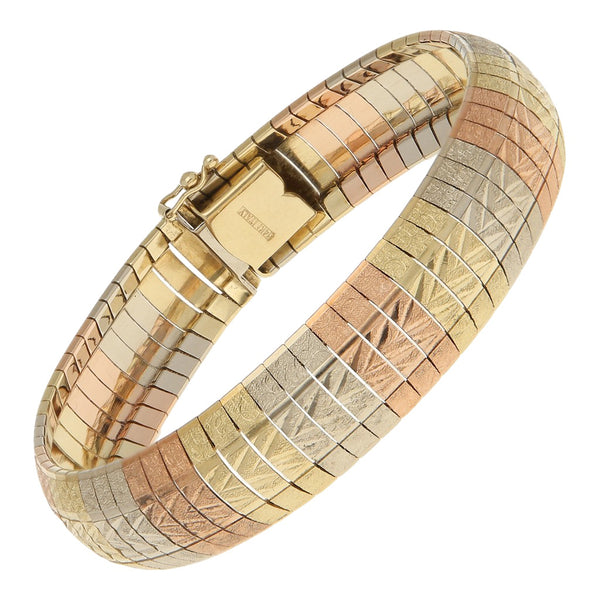 Pulsera eslabón laminado en oro tres tonos 14 kilates.