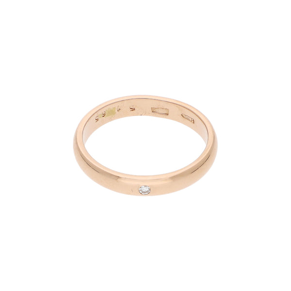 Argolla lisa con diamante en oro rosa 14 kilates.