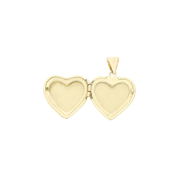 Dije porta retrato motivo corazón en oro amarillo 14 kilates.