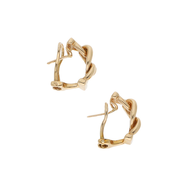 Aretes calados en oro amarillo 14 kilates.