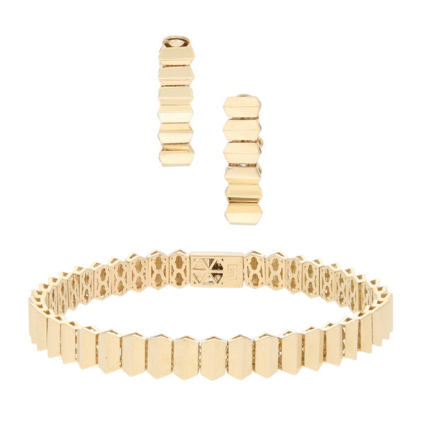 Juego de pulsera eslabón articulado y aretes articulados en oro amarillo 14 kilates.