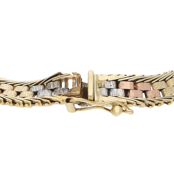 Pulsera eslabón boleado en oro tres tonos 14 kilates.