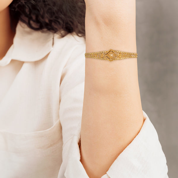Pulsera eslabón calado en oro amarillo 21 kilates.