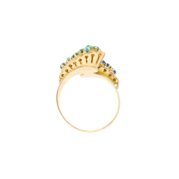 Anillo diseño especial con turquesas y sintéticos en oro rosa 18 kilates.